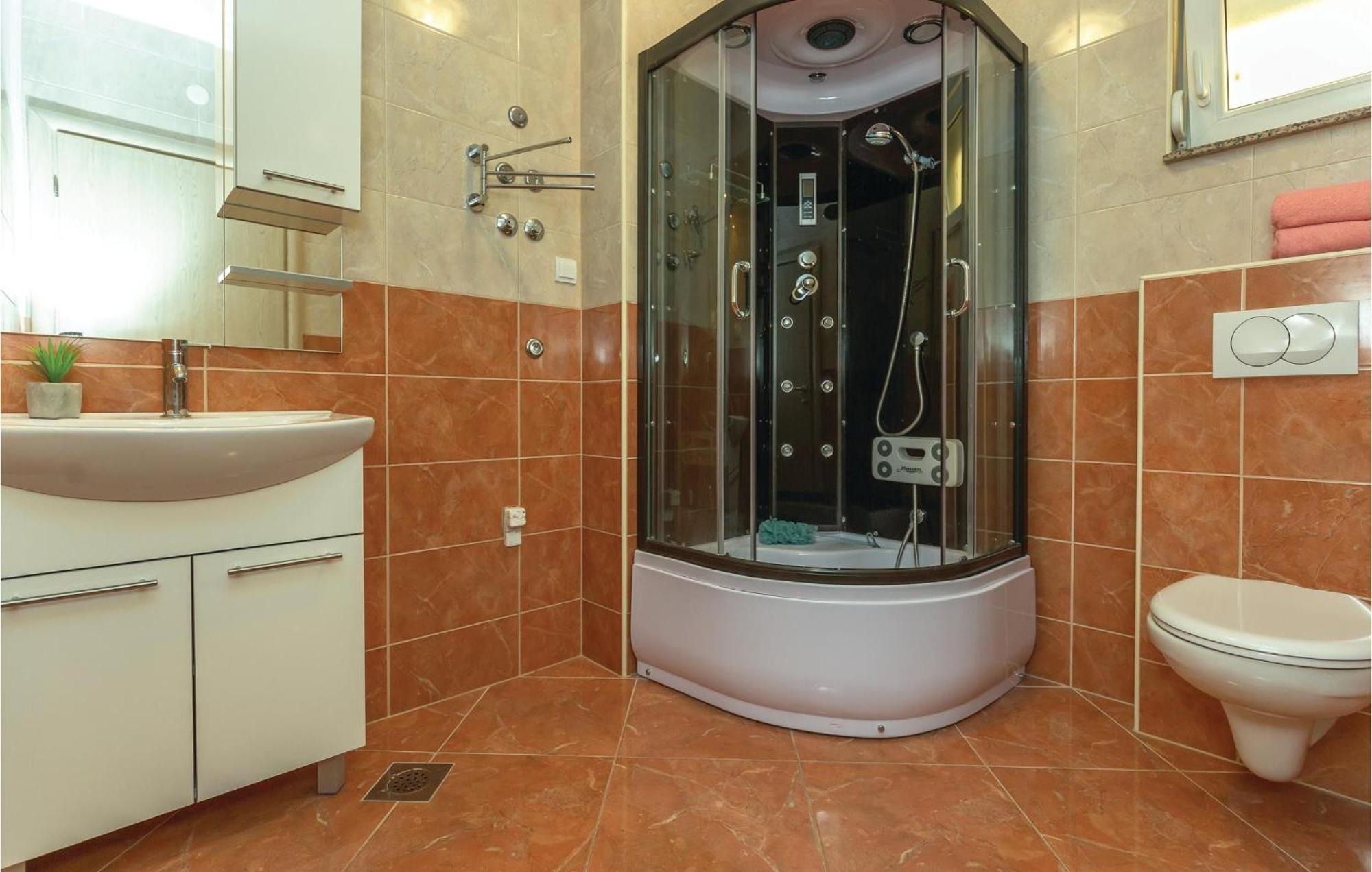 Nice Apartment In Krvavica With House Sea View Bagian luar foto