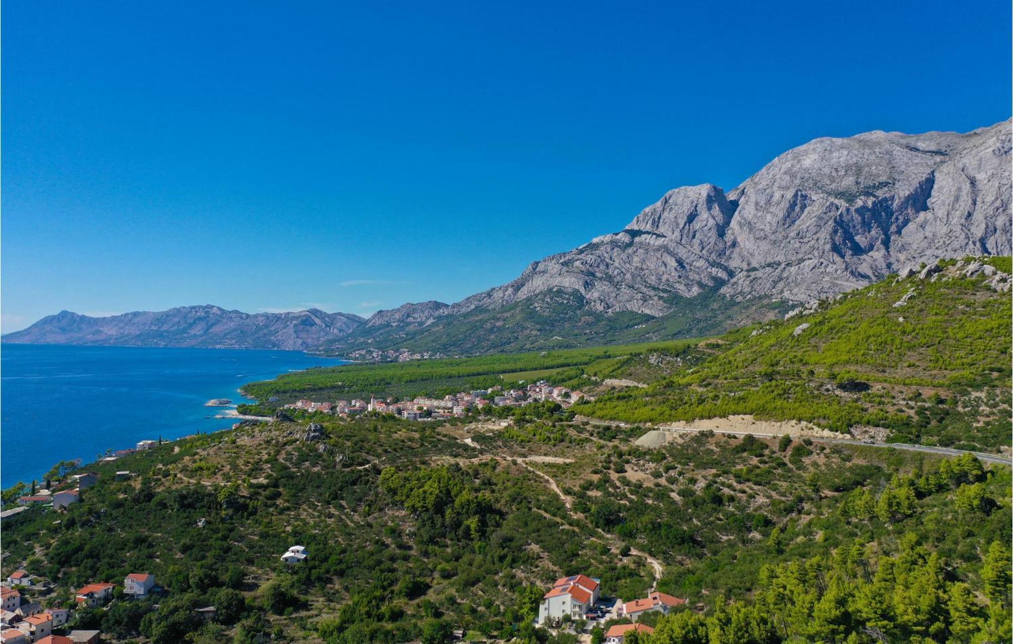 Nice Apartment In Krvavica With House Sea View Bagian luar foto