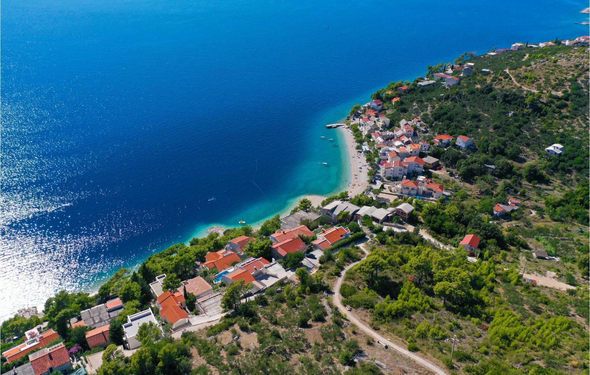Nice Apartment In Krvavica With House Sea View Bagian luar foto