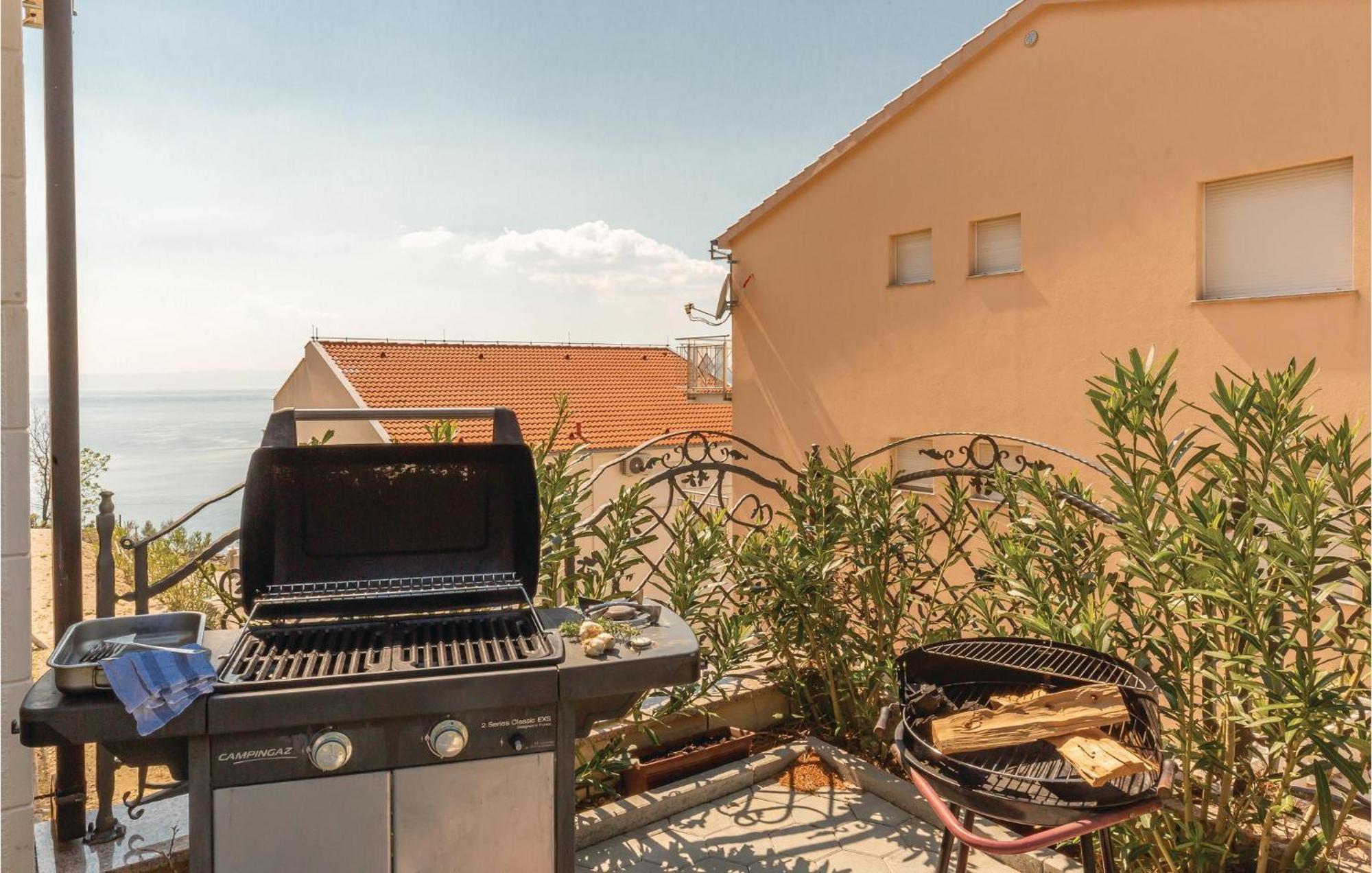 Nice Apartment In Krvavica With House Sea View Bagian luar foto
