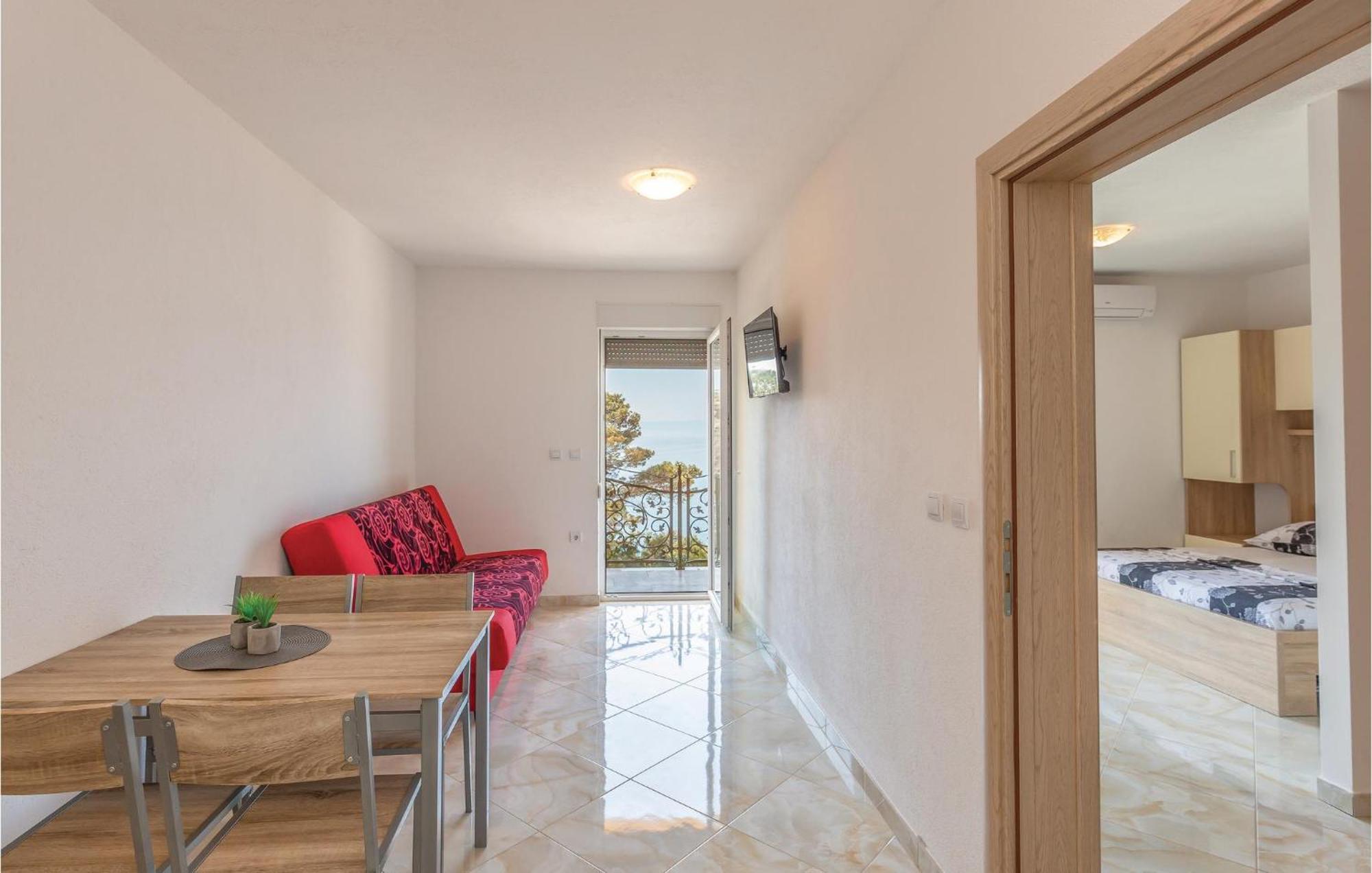 Nice Apartment In Krvavica With House Sea View Bagian luar foto