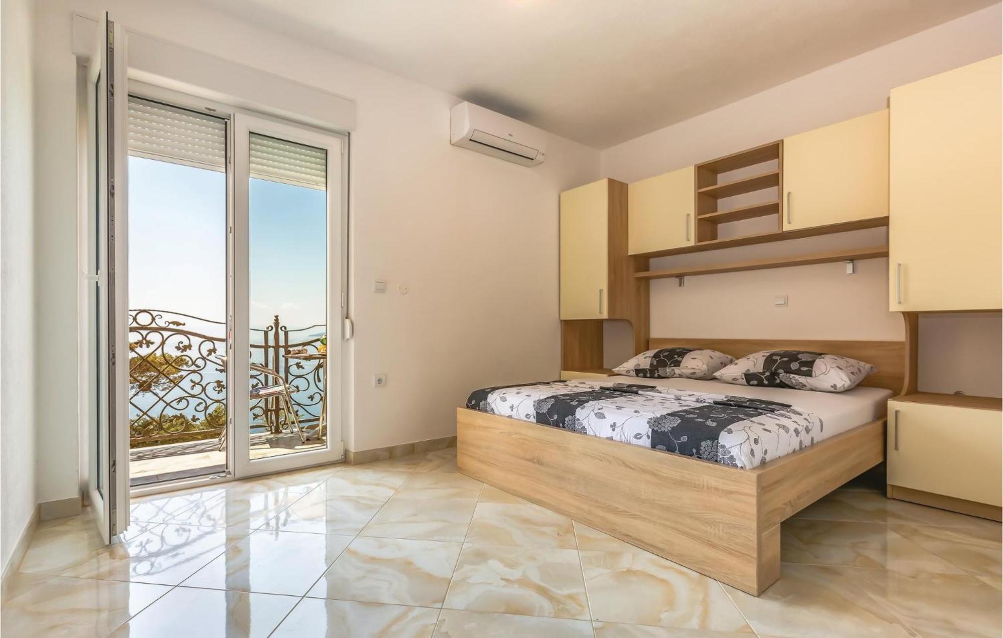 Nice Apartment In Krvavica With House Sea View Bagian luar foto